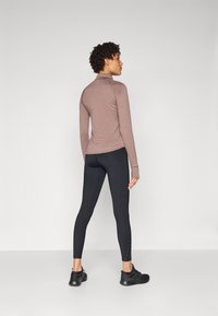 New Balance ATHLETICS REFLECTIVE HIGH RISE LEGGING  - Bėgimo tamprės - black