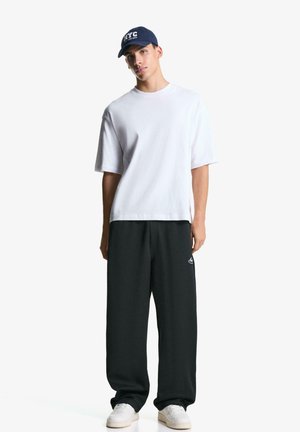 SUPER JOGGER  - Tepláky - black