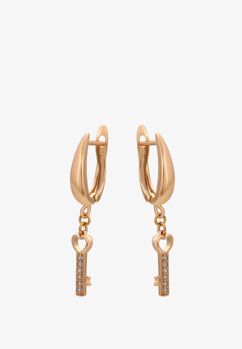 Náušnice ve tvaru kruhu z růžového zlata s designem klíče a třpytivými akcenty, zavěšené na zakřiveném kolíku. Hladký povrch a jemný řetízkový detail.