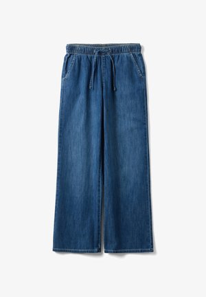 Pantalones vaqueros azules de corte holgado con cintura elástica y cordón, con bolsillos laterales y piernas anchas rectas.