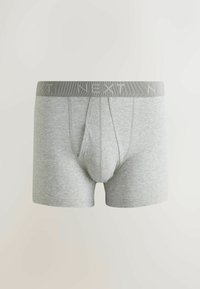 Boxer homme gris clair avec une coupe ajustée et une ceinture élastique grise avec le nom de la marque « NEXT » en lettres texturées.