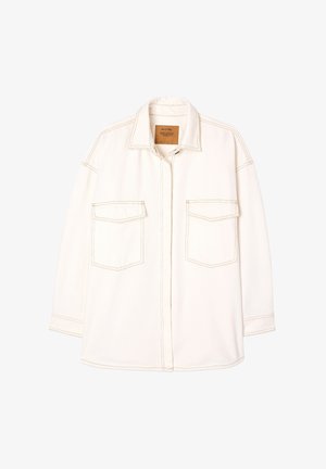 Helebeeg š shirt jakk, millel on terav krae, ees nööbid ja kaks rinna taskut. Omab kontrastset õmblust ja vabalt istuvat lõiget.