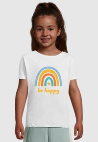 White cotton T-shirt featuring a colorful rainbow design with blue, orange, and yellow arcs, and the text "be happy" in yellow below.