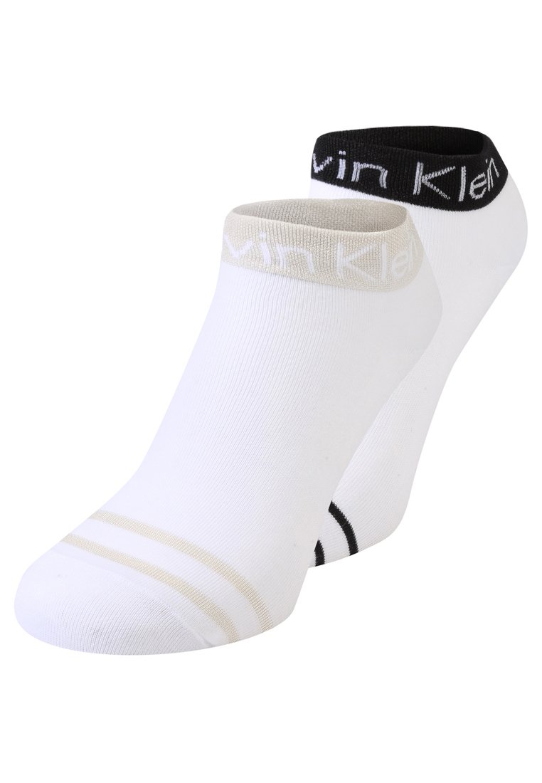 Two pairs of ankle socks: one in white with a beige stripe, another in white with a black stripe. Elasticized cuffs with logo accents.