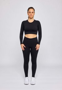 SNOCKS Legging - schwarz