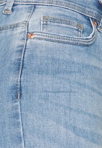 ONLY ONLWAUW LIFE FLARE  - Flared jeans - light medium blue