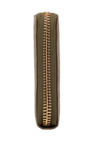 Close-up view of a green fabric wallet with a gold metallic zipper along the center.