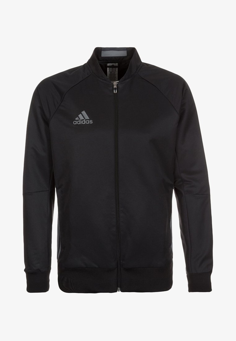 Sort zip-jakke med ståkrave, raglanærmer, glat tekstur og et gråt Adidas-logo på venstre bryst.