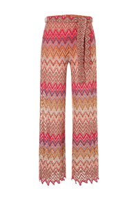 Pantalons à jambes larges avec un motif en zigzag dans des couleurs vives comprenant le rouge, l'orange et le violet. Fabriqués dans un tissu léger et texturé.