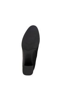Czarna podeszwa buta o gładkiej fakturze, lekko wygiętym kształcie i gumowym obcasie. Zawiera subtelną markę na wkładce.