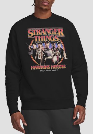 NETFLIX, STRANGER THINGS  HAWKINS HEROES GROUP 1987 - Sweatshirt - black