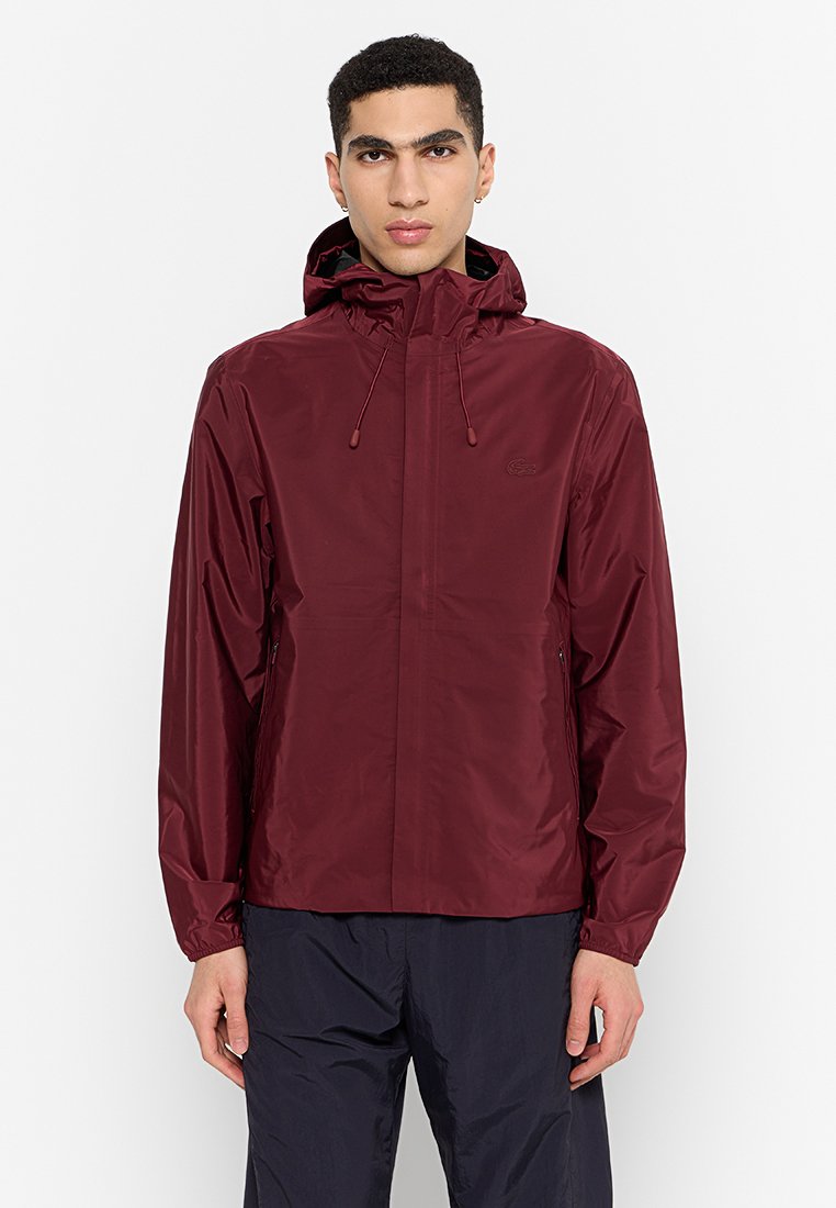 Lacoste Lichte jas donkerrood