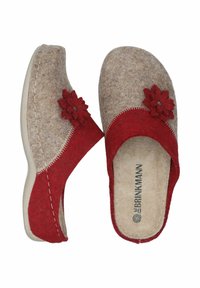 Wool felt clogs in beige and red, featuring floral embellishments and contrasting stitching. Textured upper and cushioned insoles.