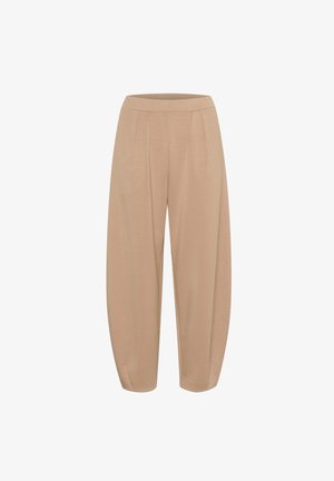 Beige, šaurināti bikses ar mīkstu tekstūru, kurām ir elastīga josta un krokoti priekšpuse, kas piešķir papildu stilu un komfortu.