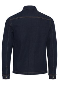 Dark blue denim jacket with long sleeves, a collared neckline, and contrasting orange stitching. Features snap buttons on cuffs.