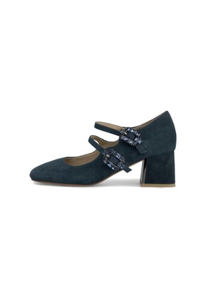 Scarpe Mary Jane in suede di color verde scuro, con due cinturini e decorazioni in blu con pietre preziose, punta appuntita e tacco a blocco quadrato.