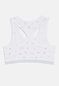 Hvit avkortet bralette med racerback-design; har et blomsterprint i pastellfarger. Myk stoff med en elastisk passform.