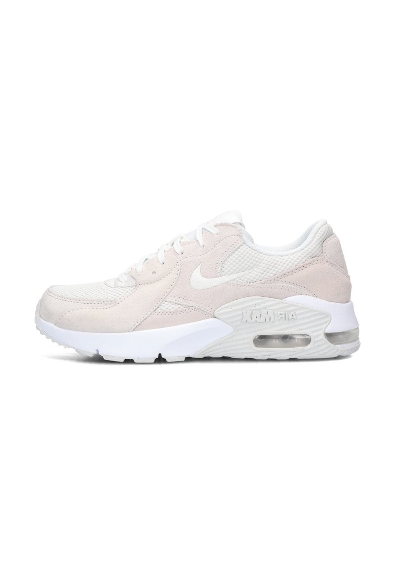 Zapatillas de deporte beige claro que combinan materiales de ante y malla, con punta redonda, diseño con cordones y amortiguación Air Max visible en la suela.