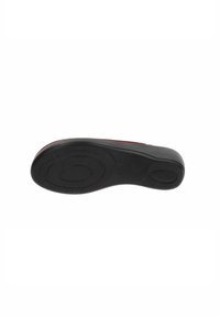 Suola di scarpa in gomma nera con superficie texturizzata, caratterizzata da un motivo circolare e bordi rialzati. Materiale resistente con una finitura liscia.