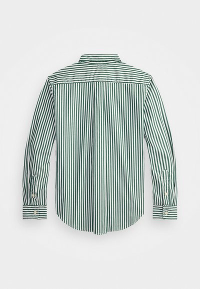 Zelena in bela črtasta srajca z dolgimi rokavi, ovratnikom, gumbastimi manšetami in zaobljenim robom. Narejena iz lahkotnega materiala. Prikazan zadnji pogled.