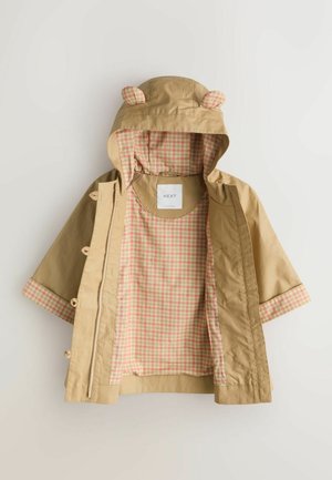 Tan hooded jacket with bear ears, features a pink and white checked lining and snap closures. Smooth texture, mid-length sleeves.