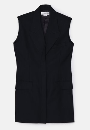 Črni krojeni brezrokavnik z strukturirano zasnovo, ostrimi reverji in sprednjimi žepi. Ima gladko notranjo podlogo.