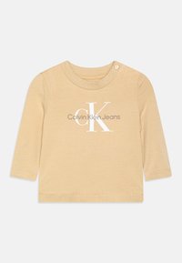Valittu, pale khaki