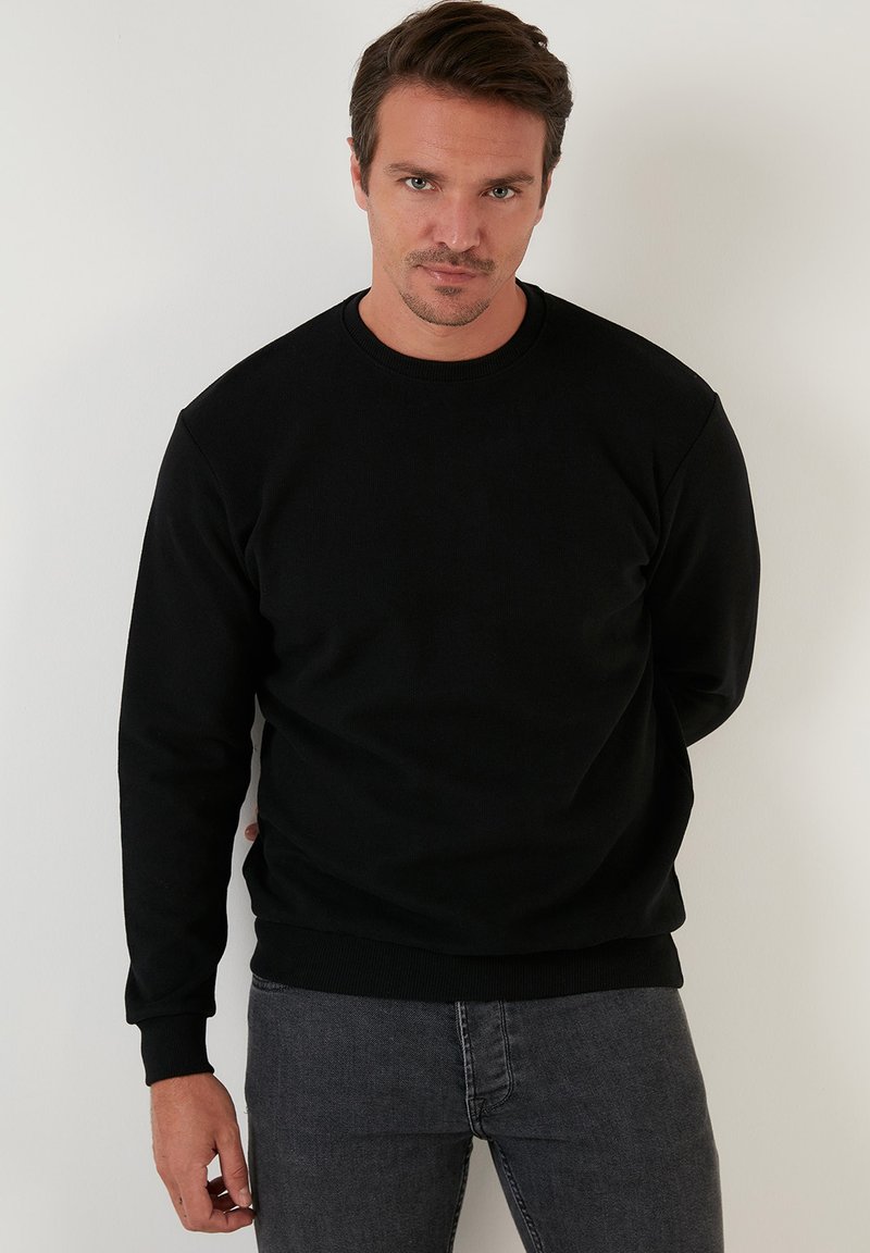 Buratti SLIM FIT Jumper black Zalando.de