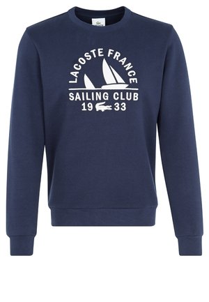 Marineblauer Pullover mit dem Text "Lacoste France Sailing Club 1933" und einer weißen Segelboot-Grafik auf der Brust.
