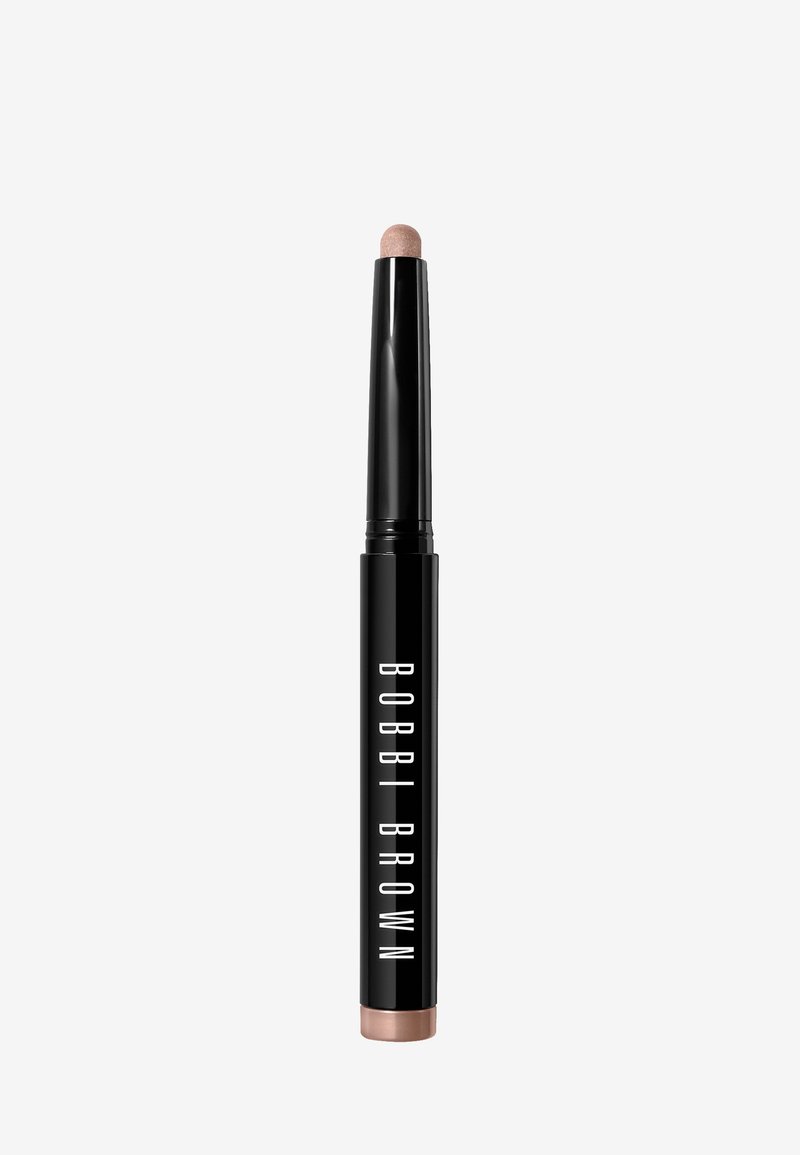 Black lip pencil with a rose gold accent. Features a smooth, rounded tip for application. Text displays “BOBBI BROWN” vertically.