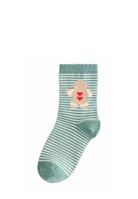 Grün gestreifte Socke mit einem hellblauen Bündchen, das ein Design eines braunen Teddybären mit roten Wangen und einem roten Herzen auf der Vorderseite zeigt.