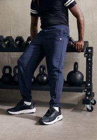 Champion - ICONS ELASTIC CUFF PANTS LOOSE FIT - Treniņtērpa apakšdaļas - dark blue Miniatūras attēls 1