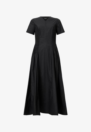 Black cotton dress featuring short sleeves, a front zipper, and smocked details at the waist, with a flowing skirt design.