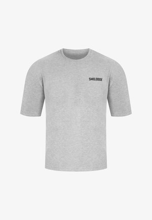 Szara koszulka z krótkim rękawem, wykonana z miękkiego materiału, z czarnym logo "SMILODOX" na górnej lewej części klatki piersiowej. Klasyczny design z okrągłym dekoltem.