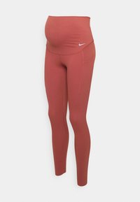 Leggings per maternità di colore rosso ruggine, con una vita alta, tessuto elasticizzato e una tasca laterale. Logo Nike sulla parte anteriore.