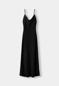 Czarna midi sukienka z regulowanymi cienkimi paskami, dekoltem w kształcie V i białymi grochami. Lekki materiał o gładkiej fakturze i sylwetce A-line.
