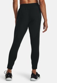 Under Armour Träningsbyxor - black