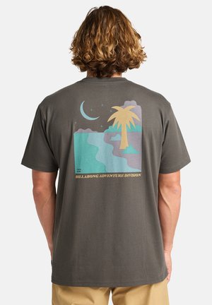 Short-sleeve, dark gray T-shirt featuring a colorful graphic of a sunset scene with a palm tree, mountains, and water on the back.