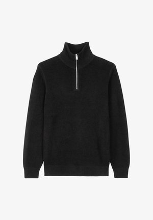 Schwarzer Pullover aus weichem Stoff, mit hohem Kragen und einem kurzen Reißverschluss am Hals. Rippbündchen an den Ärmeln und am Saum.