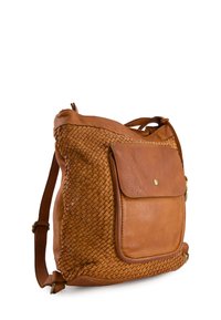 Brown leather bag with woven texture on one side, a flat front pocket, and adjustable strap. Features brass hardware and a clean design.