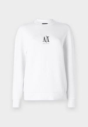 Sudadera blanca con mangas largas, puños acanalados y cuello redondo. Presenta un logo negro en la parte delantera. Tejido liso y ligero.