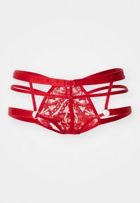 Lingerie rouge avec des détails en dentelle, dotée de multiples bretelles ajustables et d'accents en métal en forme de cercle. Tissu transparent avec des motifs floraux.