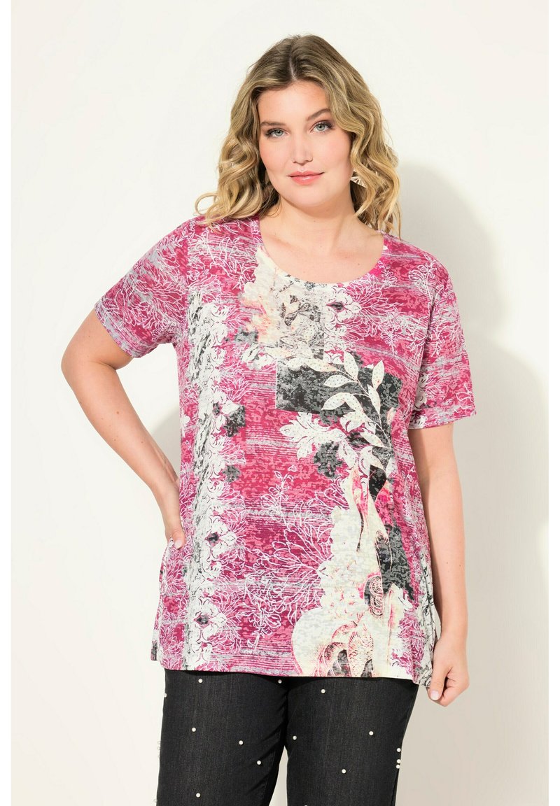 Kortärmad skjorta i nyanser av rosa och grått med blommönster, rundad halsringning och mjukt tyg. Avslappnad passform med sidofickor.
