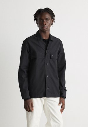 Calvin Klein OVERSHIRT - Leichte Jacke - black