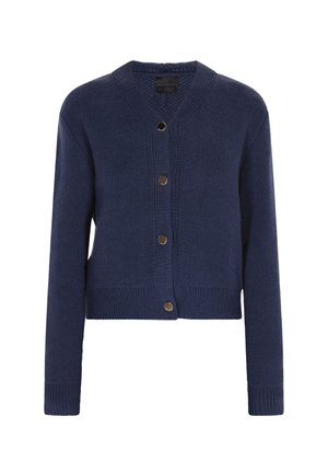 Námořnický modrý pletený cardigan s knoflíkovou přední částí, ve tvaru V a žebrovanými manžetami a lemem. Obsahuje čtyři kulaté knoflíky ve zlatém tónu.