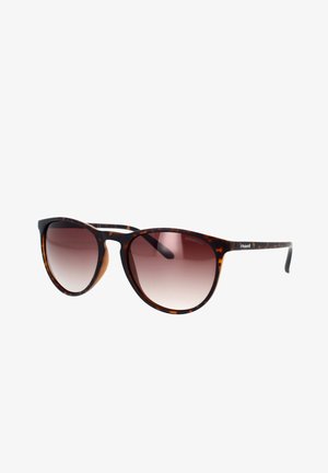 Tortoiseshell sunglasses with brown gradient lenses, oval shape, and tortoiseshell pattern on the frame. Polaroid logo on the side.