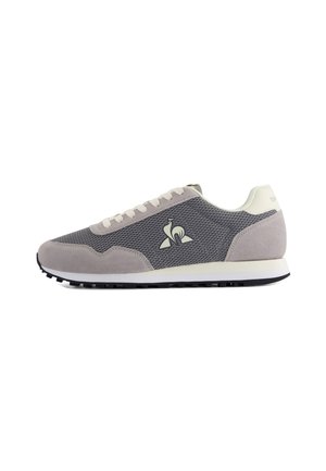 Gray mesh and suede sneaker with a white sole and light gray accents, featuring a logo on the side and lace closure.
