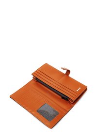 Orange leather wallet with multiple card slots, a zippered compartment, and a textured ID window. Features a clasp closure for security.