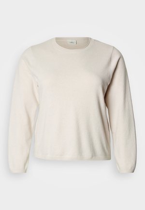 Camisola de manga comprida bege claro feita de tecido macio. Design com gola redonda e bainha e punhos canelados. Textura suave, detalhes mínimos.