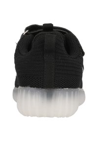 Sneaker nera in maglia con parte superiore testurizzata e suola in gomma traslucida, dotata di una linguetta sul retro per indossarla facilmente.